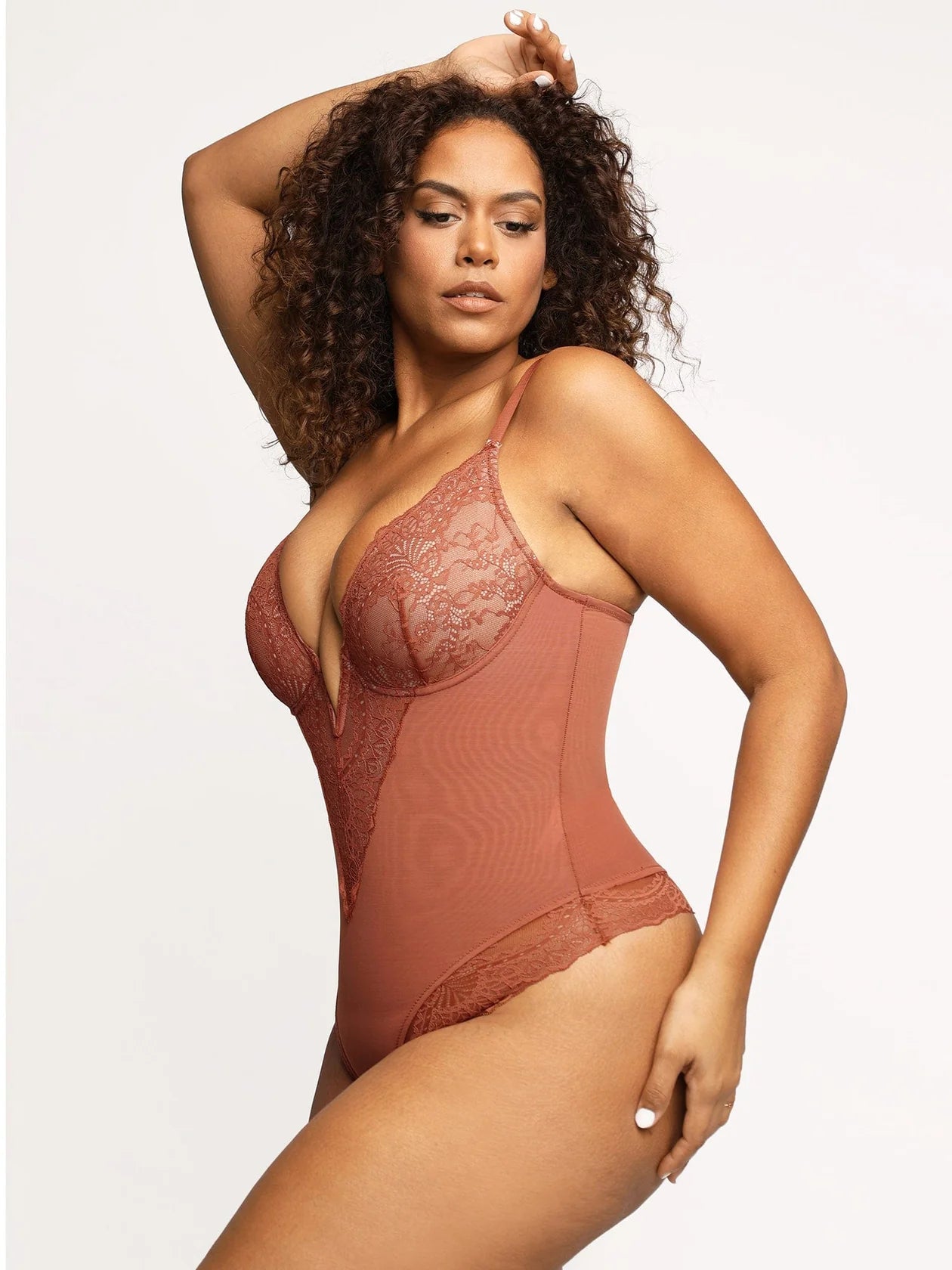 KANTEN BODYSUIT MET DIEPE V-HALS